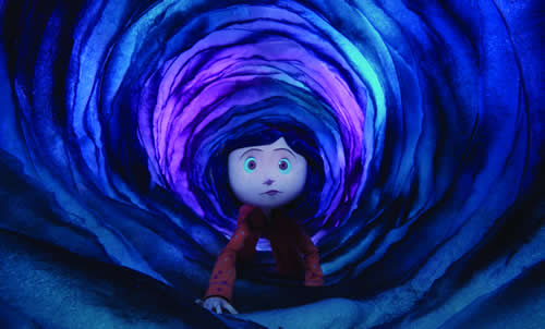 Wide-eyed young girl holds on in the middle of a spiraling tunnel