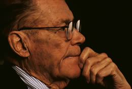Still profile of a man wearing glasses