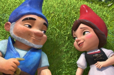 Two animated gnomes lie on the grass side by side 
