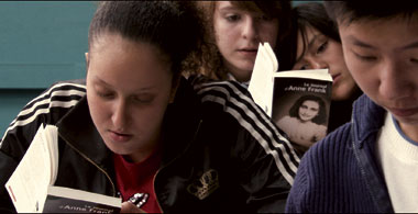 Esmerelda, a teenage girl in The Class, is shown reading aloud from The Diary of Anne Frank as her classmates follow in their books. 